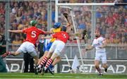 28 September 2013; Shane O'Donnell, Clare, scores his and his side's third goal despite the best efforts of Brian Murphy, 5, and Shane O'Neill, Cork. GAA Hurling All-Ireland Senior Championship Final Replay, Cork v Clare, Croke Park, Dublin. Picture credit: Brendan Moran / SPORTSFILE