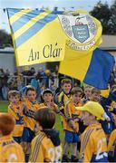 2 October 2013; Young Sixmilebridge club members form a guard of honour for the Clare teams before the game. GOAL Challenge, Clare A v Clare B, Sixmilebridge, Co. Clare. Picture credit: Diarmuid Greene / SPORTSFILE