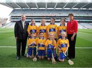 28 September 2013; Uachtarán Chumann Lœthchleas Gael Liam î NŽill, left, and President of the Camogie Association Aileen Lawlor with the Clare camogie team, back row, left to right, Patricia Lawlor, Killinure NS, Mountrath, Co. Laois, Mary Enright, Clonmoney NS, Newmarket-on-Fergus, Co. Clare, Eileen Daly, Feakle NS, Feakle, Co. Clare, Mollie Somers, St. Patrick's NS, Arklow, Co. Wicklow, front row, left to right, Cliona Arthur, Primate Dixon PS, Coalisland, Co. Tyrone, Niamh Niland, Killeeneen NS, Killeeneen, Craughwell, Co. Galway, Emily Mullins, Laurel Hill FCJ, South Circular Road, Limerick, Eve Somers, St. Mary's College, Arklow, Co. Wicklow. INTO/RESPECT Exhibition GoGames during the GAA Hurling All-Ireland Senior Championship Final Replay between Cork and Clare, Croke Park, Dublin. Picture credit: Daire Brennan / SPORTSFILE