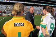 29 September 2013; Pat Quill, President of the Ladies Gaelic Football Association meets Offaly captain Siobhan Flannery before the game. TG4 All-Ireland Ladies Football Junior Championship Final, Offaly v Wexford, Croke Park, Dublin. Picture credit: Brendan Moran / SPORTSFILE
