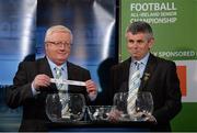 3 October 2013; Michael Delaney, CEO of the Leinster Council, in the company of Martin Skelly, right, Chairman of the Leinster Council, pulls out the name of All-Ireland Champions Dublin while making the draw for the GAA Leinster Senior Football Championship, during the 2014 GAA Senior Provincial Championship Draw. Croke Park, Dublin. Picture credit: Matt Browne / SPORTSFILE