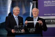 3 October 2013; Robert Frost, right, Chairman of the Munster Council, in the company of Simon Moroney, CEO of the Munster Council, pulls out the name of All-Ireland Champions Clare while making the draw for the GAA Munster Senior Hurling Championship, during the 2014 GAA Senior Provincial Championship Draw. Croke Park, Dublin. Picture credit: Matt Browne / SPORTSFILE