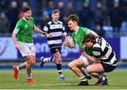 12 February 2025; Patrick Coleman of Gonzaga College is tackled by Robert Carney of Cistercian College, Roscrea during the Bank of Ireland Leinster Rugby Boys Schools Senior Cup second round match between Cistercian College Roscrea and Gonzaga College at Energia Park in Dublin. Photo by Shauna Clinton/Sportsfile