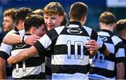 12 February 2025; Robert Carney of Cistercian College, Roscrea, centre, celebrates with team-mates Fionn Higgins, left, and Aaron Moloney after their side's victory in the Bank of Ireland Leinster Rugby Boys Schools Senior Cup second round match between Cistercian College Roscrea and Gonzaga College at Energia Park in Dublin. Photo by Shauna Clinton/Sportsfile