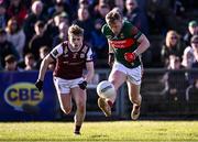 2 February 2025; Ryan O'Donoghue of Mayo gets away from Johnny McGrath of Galway during the Allianz Football League Division 1 match between Mayo and Galway at Hastings Insurance MacHale Park in Castlebar, Mayo. Photo by Piaras Ó Mídheach/Sportsfile