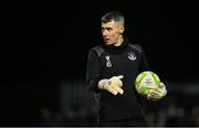 14 February 2025; Drogheda United goalkeeper Luke Dennison warms up before the SSE Airtricity Men's Premier Division match between St Patrick's Athletic and Drogheda United at Richmond Park in Dublin. Photo by Shauna Clinton/Sportsfile