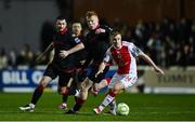 14 February 2025; Brandon Kavanagh of St Patrick's Athletic in action against Shane Farrell of Drogheda United during the SSE Airtricity Men's Premier Division match between St Patrick's Athletic and Drogheda United at Richmond Park in Dublin. Photo by Seb Daly/Sportsfile