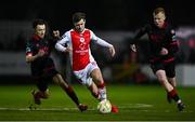 14 February 2025; Barry Baggley of St Patrick's Athletic in action against Drogheda United players Darragh Markey, left, and Shane Farrell during the SSE Airtricity Men's Premier Division match between St Patrick's Athletic and Drogheda United at Richmond Park in Dublin. Photo by Seb Daly/Sportsfile
