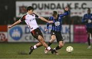 14 February 2025; Billy Gilmore of Athlone Town is tackled by Andy Paraschiv of Dundalk during the SSE Airtricity Men's First Division match between Dundalk and Athlone Town at Oriel Park in Dundalk, Louth. Photo by Ben McShane/Sportsfile