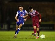 14 February 2025; Barry Coffey of Cobh Ramblers in action against Lee Devitt of Treaty United during the SSE Airtricity Men's First Division match between Treaty United and Cobh Ramblers at Markets Field in Limerick. Photo by Michael P Ryan/Sportsfile