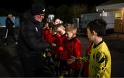 14 February 2025; Finn Harps manager Darren Murphy meets the mascots from Ferry Rangers in Tarbert, Kerry, before the SSE Airtricity Men's First Division match between Kerry FC and Finn Harps at Mounthawk Park in Tralee, Kerry. Photo by Brendan Moran/Sportsfile