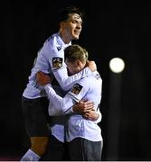 14 February 2025; James Crawford of Wexford, right, celebrates with team-mates Jack Larkin, centre, and Zayd Abada  after scoring their side's first goal during the SSE Airtricity Men's First Division match between UCD and Wexford at UCD Bowl in Belfield, Dublin. Photo by Tyler Miller/Sportsfile