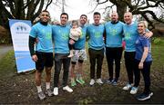 15 February 2025; Sanctuary Runners CEO and former Dublin footballer Michael Darragh MacAuley, current Kerry footballer Stefan Okunbor and former Kerry footballers David Moran, Tommy Walsh, Mike Quirke and Kieran Donaghy and with a sanctuary runner after taking part in the Tralee Parkrun. Sanctuary Runners is a solidarity-through-sport movement which uses running, jogging and walking to bring together asylum seekers, refugees, migrants and all Irish residents and is supporting community integration in Trale, Killarney and Kenmare. For more information, email info@sanctuaryrunners.ie  Photo by Brendan Moran/Sportsfile