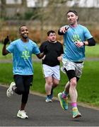 15 February 2025; Sanctuary Runners CEO and former Dublin footballer Michael Darragh MacAuley, right, taking part in the Tralee Parkrun. Sanctuary Runners is a solidarity-through-sport movement which uses running, jogging and walking to bring together asylum seekers, refugees, migrants and all Irish residents and is supporting community integration in Trale, Killarney and Kenmare. For more information, email info@sanctuaryrunners.ie  Photo by Brendan Moran/Sportsfile Photo by Brendan Moran/Sportsfile