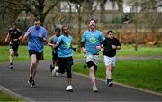 15 February 2025; Sanctuary Runners CEO and former Dublin footballer Michael Darragh MacAuley, second from right, taking part in the Tralee Parkrun. Sanctuary Runners is a solidarity-through-sport movement which uses running, jogging and walking to bring together asylum seekers, refugees, migrants and all Irish residents and is supporting community integration in Trale, Killarney and Kenmare. For more information, email info@sanctuaryrunners.ie  Photo by Brendan Moran/Sportsfile Photo by Brendan Moran/Sportsfile