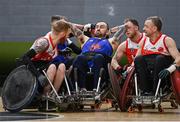 15 February 2025; Shane Delaney of Laois Lions in action against, from left, Alan Lynch, Jack Squibb and John McCarthy of Rebel Wheelers during the Irish Wheelchair Rugby League Round 4 match between Rebel Wheelers and Laois Lions at the IWA Gym & Sports Hall in Clontarf, Dublin. The Irish Wheelchair Rugby League heated up with the fourth round taking place at IWA-Sport. Cork’s Rebel Wheelers Multi-Sport Club faced Laois Lions WRC in the opening fixture, before the Lions took on Ulster Barbarians. The round closed out with Barbarians going up against league leaders, Rebels. Photo by Sam Barnes/Sportsfile