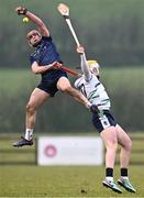 15 February 2025; Peter Clarke of DCU DÉ in action against Seán Rynne of UL during the Electric Ireland Higher Education GAA Fitzgibbon Cup final match between DCU Dóchas Éireann v University of Limerick at the GAA Connacht Centre of Excellence in Bekan, Mayo. Photo by Piaras Ó Mídheach/Sportsfile