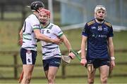 15 February 2025; UL players Gearóid O'Connor, left, and Aaron Morgan celebrate after their side's victory, as Conor Kehoe of DCU DÉ looks on, after the Electric Ireland Higher Education GAA Fitzgibbon Cup final match between DCU Dóchas Éireann and University of Limerick at the GAA Connacht Centre of Excellence in Bekan, Mayo. Photo by Piaras Ó Mídheach/Sportsfile