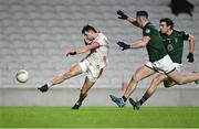 15 February 2025; Chris Óg Jones of Cork shoots to score his side's third goal despite the attempts of Jack Geoghegan, left, and Charlie Drumm of Westmeath during the Allianz Football League Division 2 match between Cork and Westmeath at SuperValu Páirc Uí Chaoimh in Cork. Photo by Tom Beary/Sportsfile