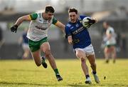 8 February 2025; Paudie Clifford of Kerry is tackled by Caolan McGonagle of Donegal during the Allianz Football League Division 1 match between Kerry and Donegal at Fitzgerald Stadium in Killarney, Kerry. Photo by Brendan Moran/Sportsfile