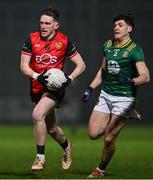 15 February 2025; Miceal Rooney of Down in action against Seamus Lavin of Meath during the Allianz Football League Division 2 match between Down and Meath at Páirc Esler in Newry, Down. Photo by Stephen Marken/Sportsfile