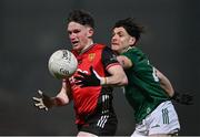 15 February 2025; Miceal Rooney of Down in action against Seamus Lavin of Meath during the Allianz Football League Division 2 match between Down and Meath at Páirc Esler in Newry, Down. Photo by Stephen Marken/Sportsfile