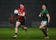 15 February 2025; Miceal Rooney of Down in action against Seamus Lavin of Meath during the Allianz Football League Division 2 match between Down and Meath at Páirc Esler in Newry, Down. Photo by Stephen Marken/Sportsfile