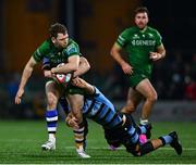 15 February 2025; Cathal Forde of Connacht is tackled by Cardiff Rugby players Alex Mann of Cardiff Rugby during the United Rugby Championship match between Connacht and Cardiff Rugby at Dexcom Stadium in Galway. Photo by Shauna Clinton/Sportsfile