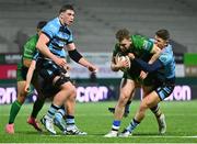 15 February 2025; Cathal Forde of Connacht is tackled by Callum Sheedy of Cardiff Rugby during the United Rugby Championship match between Connacht and Cardiff Rugby at Dexcom Stadium in Galway. Photo by Shauna Clinton/Sportsfile