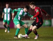 15 February 2025; Thomas Considine of Bray Wanderers in action against Dean O'Shea of Longford Town during the SSE Airtricity Men's First Division match between Longford Town and Bray Wanderers at Bishopsgate in Longford. Photo by Michael P Ryan/Sportsfile