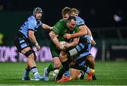 15 February 2025; Peter Dooley of Connacht is tackled by Josh McNally of Cardiff Rugby during the United Rugby Championship match between Connacht and Cardiff Rugby at Dexcom Stadium in Galway. Photo by Shauna Clinton/Sportsfile