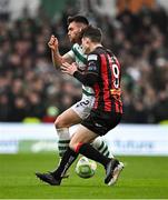 16 February 2025; Colm Whelan of Bohemians is fouled by Josh Honohan of Shamrock Rovers during the SSE Airtricity Men's Premier Division match between Bohemians and Shamrock Rovers at the Aviva Stadium in Dublin. Photo by Sam Barnes/Sportsfile