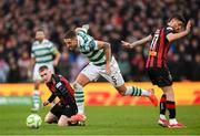 16 February 2025; Lee Grace of Shamrock Rovers in action against Ross Tierney, left, and Adam McDonnell of Bohemians during the SSE Airtricity Men's Premier Division match between Bohemians and Shamrock Rovers at the Aviva Stadium in Dublin. Photo by Stephen McCarthy/Sportsfile