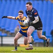 16 February 2025; Monaghan goalkeeper Rory Beggan in action against Ben O'Carroll of Roscommon during the Allianz Football League Division 2 match between Roscommon and Monaghan at King & Mofatt Dr Hyde Park in Roscommon. Photo by Stephen Marken/Sportsfile