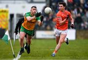 16 February 2025; Patrick McBrearty of Donegal in action against Ben Crealey of Armagh during the Allianz Football League Division 1 match between Donegal and Armagh at MacCumhaill Park in Ballybofey, Donegal. Photo by Ramsey Cardy/Sportsfile