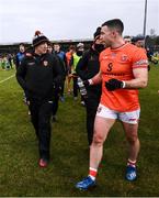 16 February 2025; Armagh manager Kieran McGeeney, left, in conversation with captain Aidan Forker at the end of the first half of the Allianz Football League Division 1 match between Donegal and Armagh at MacCumhaill Park in Ballybofey, Donegal. Photo by Ramsey Cardy/Sportsfile
