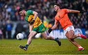 16 February 2025; Ryan McHugh of Donegal in action against Stefan Campbell of Armagh during the Allianz Football League Division 1 match between Donegal and Armagh at MacCumhaill Park in Ballybofey, Donegal. Photo by Ramsey Cardy/Sportsfile