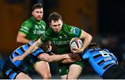 15 February 2025; Cathal Forde of Connacht is tackled by Cardiff players Dan Thomas, left, and Alex Mann during the United Rugby Championship match between Connacht and Cardiff Rugby at Dexcom Stadium in Galway. Photo by Shauna Clinton/Sportsfile
