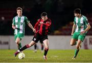15 February 2025; Francis Campbell of Longford Town in action against Bray Wanderers players, from left, Cian Doyle and Paul Murphy during the SSE Airtricity Men's First Division match between Longford Town and Bray Wanderers at Bishopsgate in Longford. Photo by Michael P Ryan/Sportsfile