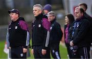 15 February 2025; Galway manager Pádraic Joyce, centre, with selector John Concannon, left, and coach Mickey Graham before the Allianz Football League Division 1 match between Derry and Galway at Celtic Park in Derry. Photo by Ramsey Cardy/Sportsfile