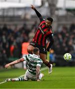 16 February 2025; Lys Mousset of Bohemians is tackled by Lee Grace of Shamrock Rovers during the SSE Airtricity Men's Premier Division match between Bohemians and Shamrock Rovers at the Aviva Stadium in Dublin. Photo by Ben McShane/Sportsfile