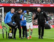 16 February 2025; Adam Matthews of Shamrock Rovers is assisted from the pitch by physiotherapist Tony McCarthy, right, team doctor Connor Gallagher, left, and medical personnel during the SSE Airtricity Men's Premier Division match between Bohemians and Shamrock Rovers at the Aviva Stadium in Dublin. Photo by Stephen McCarthy/Sportsfile