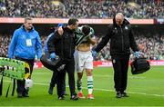 16 February 2025; Adam Matthews of Shamrock Rovers is assisted from the pitch by physiotherapist Tony McCarthy, right, team doctor Connor Gallagher, left, and medical personnel during the SSE Airtricity Men's Premier Division match between Bohemians and Shamrock Rovers at the Aviva Stadium in Dublin. Photo by Stephen McCarthy/Sportsfile