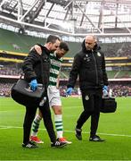 16 February 2025; Adam Matthews of Shamrock Rovers is assisted from the pitch by physiotherapist Tony McCarthy, right, and team doctor Connor Gallagher during the SSE Airtricity Men's Premier Division match between Bohemians and Shamrock Rovers at the Aviva Stadium in Dublin. Photo by Stephen McCarthy/Sportsfile