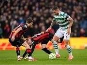 16 February 2025; Lee Grace of Shamrock Rovers in action against Ross Tierney and Adam McDonnell, left, of Bohemians during the SSE Airtricity Men's Premier Division match between Bohemians and Shamrock Rovers at the Aviva Stadium in Dublin. Photo by Stephen McCarthy/Sportsfile