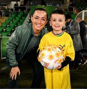 21 February 2025; The Ireland Women’s National Team is calling on fans to go all in against cancer this Daffodil Day, Friday 28 March. Ahead of their UEFA Nations League match against Turkey at Tallaght Stadium, the Girls in Green showed their support for the Irish Cancer Society’s Daffodil Day. There are lots of ways to get involved this Daffodil Day, visit cancer.ie to learn more. Pictured meeting Katie McCabe as they come out for their pre-match walk is 5-year-old Tommy Grant. Tommy was diagnosed with acute myeloid leukaemia (AML) in 2021, just before he turned 3. Tommy is now getting back to himself and is a big football fan! Photo by Stephen McCarthy/Sportsfile