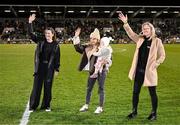 21 February 2025; Recently retired Republic of Ireland internationals, from left, Niamh Fahey Julie-Ann Russell and her daughter Rosie and Diane Caldwell during the UEFA Women's Nations League B match between Republic of Ireland and Turkiye at Tallaght Stadium in Dublin. Photo by Stephen McCarthy/Sportsfile