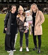 21 February 2025; Recently retired Republic of Ireland internationals, from left, Niamh Fahey, Julie-Ann Russell and her daughter Rosie and Diane Caldwell during the UEFA Women's Nations League B match between Republic of Ireland and Turkiye at Tallaght Stadium in Dublin. Photo by Stephen McCarthy/Sportsfile