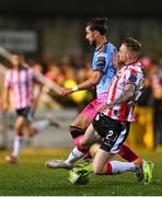 21 February 2025; Connor Parsons of Bohemians is tackled by Ronan Boyce of Derry City during the SSE Airtricity Men's Premier Division match between Derry City and Bohemians at The Ryan McBride Brandywell Stadium in Derry. Photo by Shauna Clinton/Sportsfile