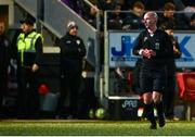 21 February 2025; Referee Marc Lynch, right, after showing a red card to Bohemians manager Alan Reynolds, left, and Derry City manager Tiernan Lynch, not pictured, during the SSE Airtricity Men's Premier Division match between Derry City and Bohemians at The Ryan McBride Brandywell Stadium in Derry. Photo by Shauna Clinton/Sportsfile